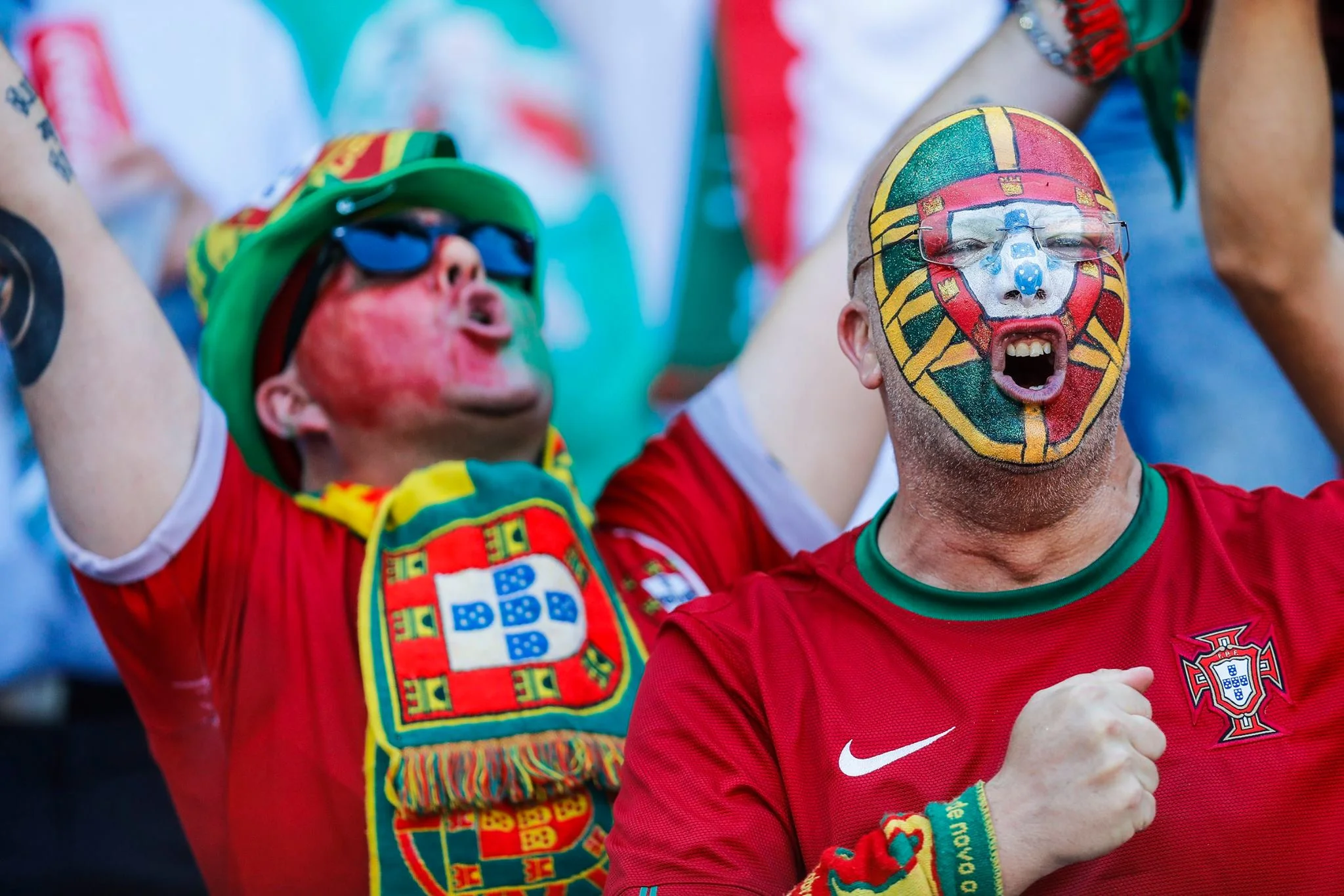 Funny fans faces with portugal flag