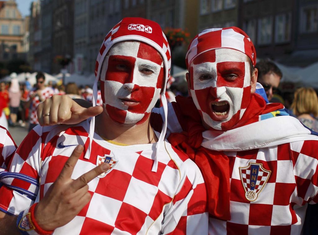 Croatian fans cheer celebrations before Euro 2012 soccer match against Spain in the Old Town of Gdansk