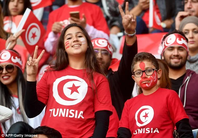 Girls Boys ready to support their country of tunisia in soccer world cup Girls & Boys ready to support their country of tunisia in soccer world cup