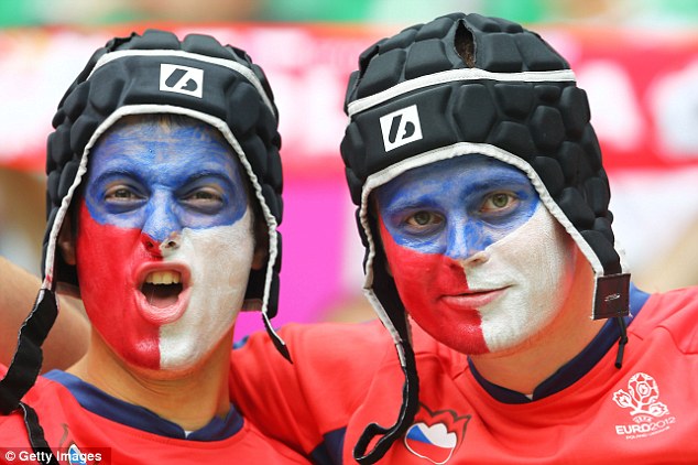 colorful faces of czech republic soccer fans