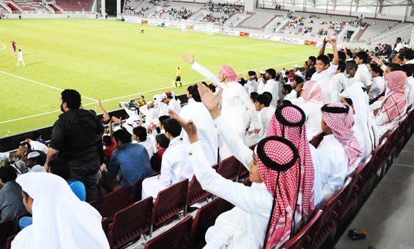 Qatar-football-fans-cheer-in-world-cup-tournament